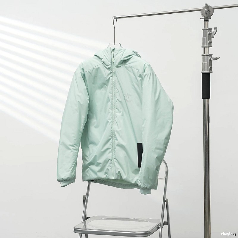 Clean Hooded Profile And Minimal Chest Branding Arc'teryx Lightweight Shell Jacket in Mint Green