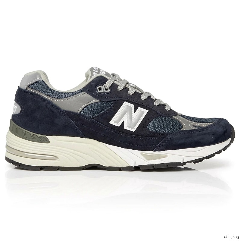 New Balance retro-style dark blue and grey sports shoes