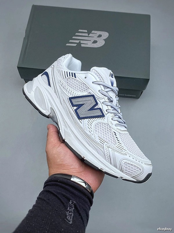 New Balance White and Navy Running Shoes Defined by Classic Running Profile