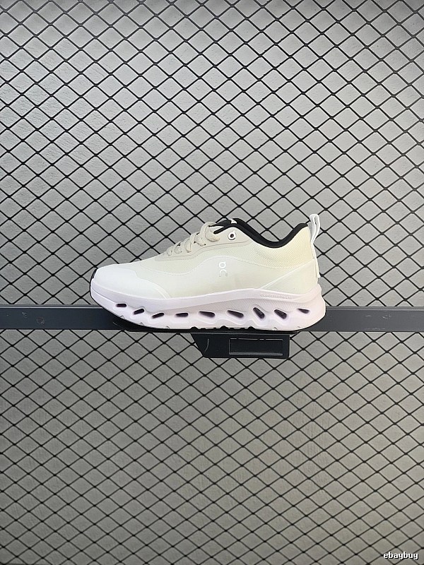 On Cloud Runners in White and Black, Finished with Layered Mesh Upper