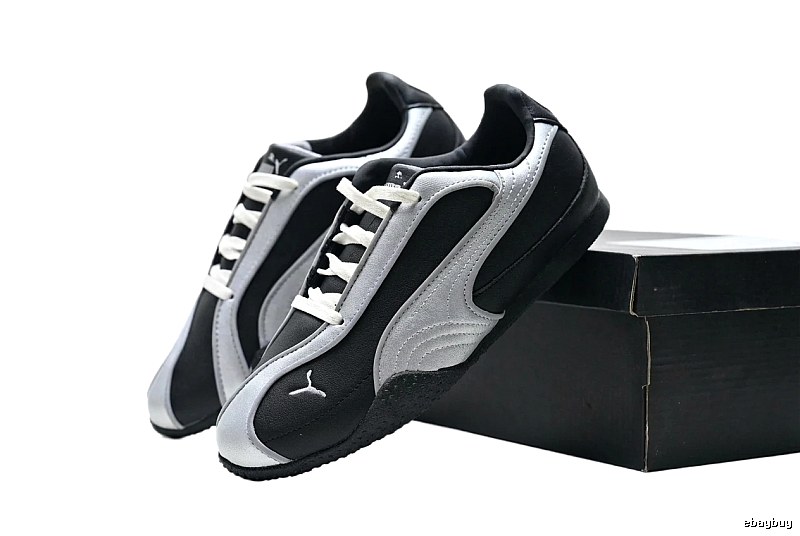 PUMA retro style black and silver sports shoes